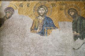 jesus and saints, aged mosaic on wall, turkey, istanbul, hagia sophia