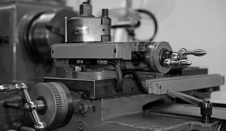 black and white photo of a lathe