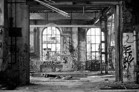 black and white photo of an old ward in an abandoned hospital