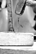 hammering a nail