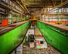 crane and mud in an abandoned factory