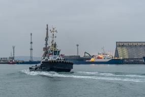 tug on the water in the port