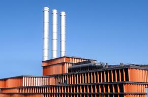 roof of Industrial building with three chimneys