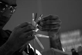 man holding technical tools