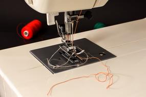 Sewing Machine red thread