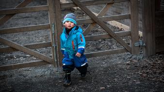 boy in blue winter suit