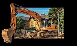 drawn excavator on the background of the house