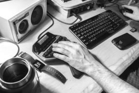 Audio Cellphone Desk hand black and white