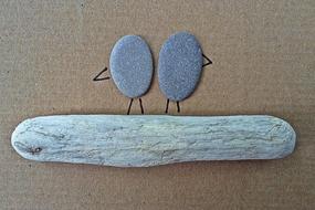 rocks on driftwood