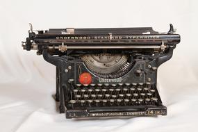 photo of black mechanical retro typewriter