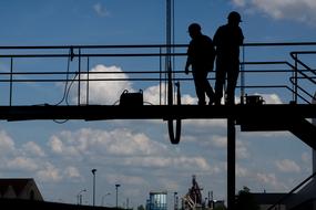 construction workers on the industrial bridge