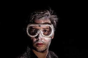 dirty worker in glasses