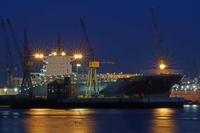 photo of a large warship in the port in Hamburg