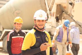 happy workers at a construction site