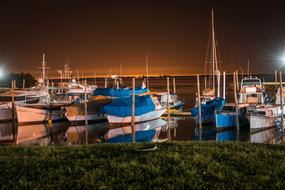 night landscape of boats near the coastline
