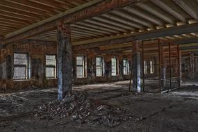 photo of garbage in an abandoned factory