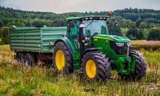 Tractor with trailer in countryside, Agricultural Machine