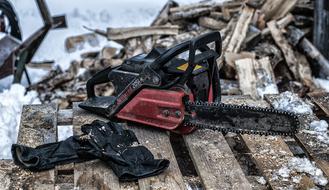 Work Gloves and Chainsaw