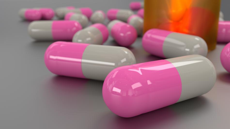grey and pink capsules