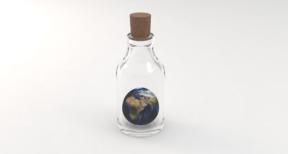bottle with earth globe inside