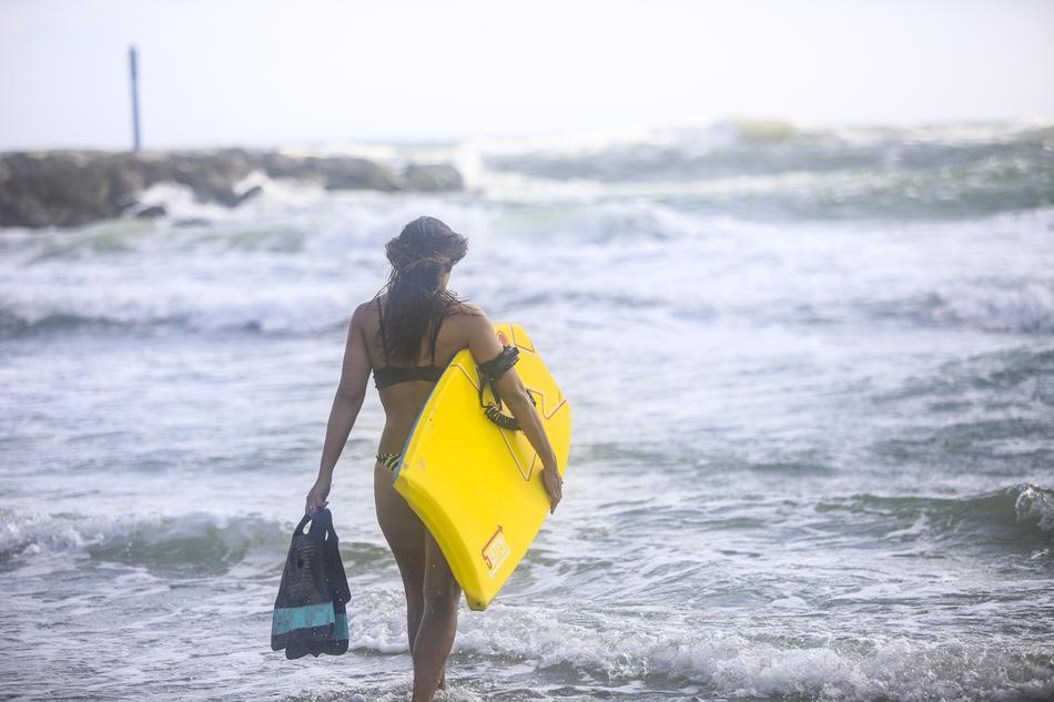 woman with body board