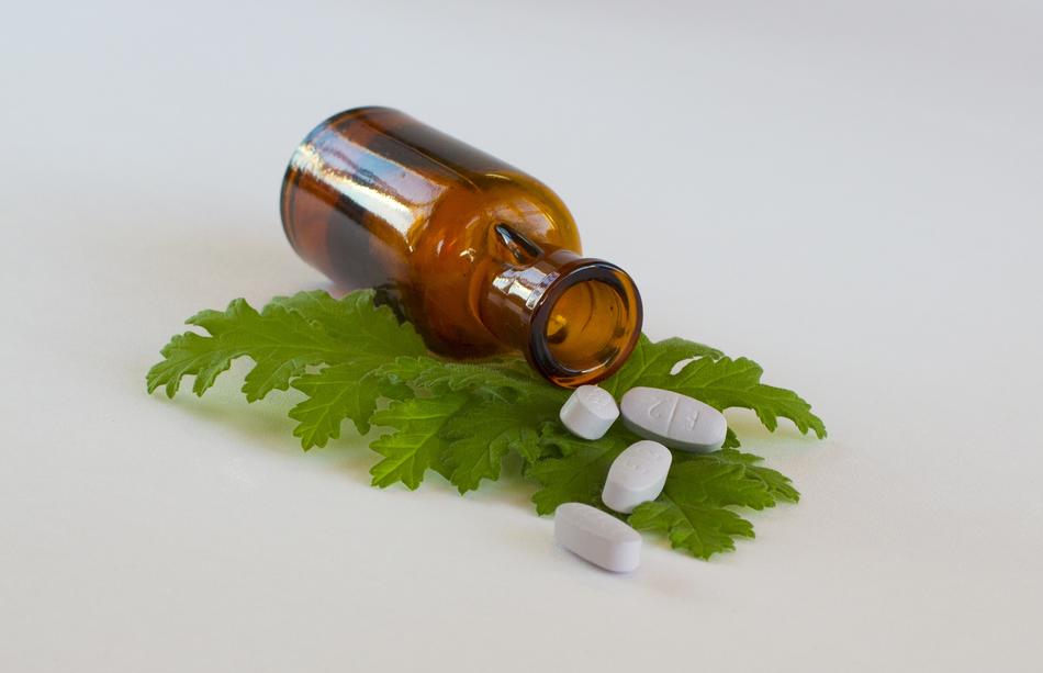 bottle and tablets on Leaves