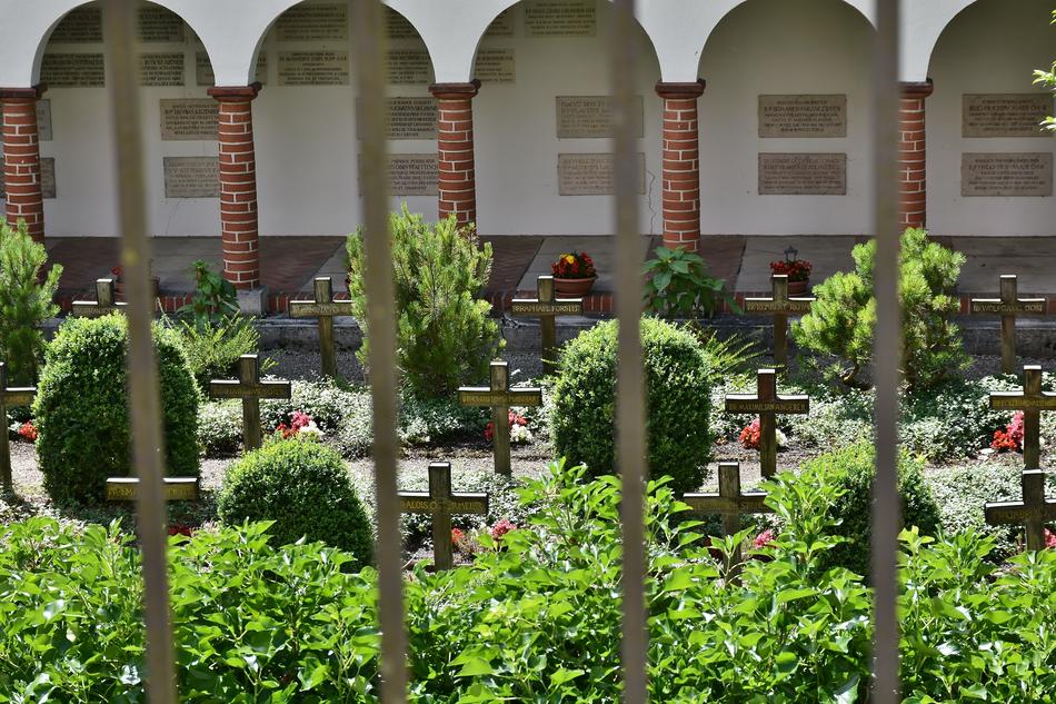 photo of the cemetery through the bars
