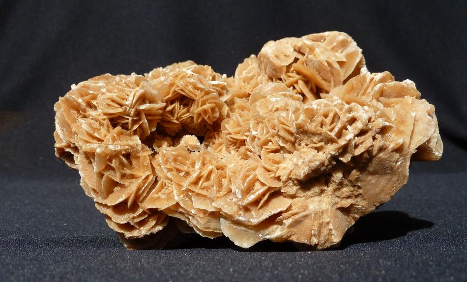 Sand rose on the black surface