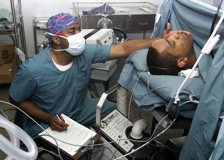 doctor with patient in operating room