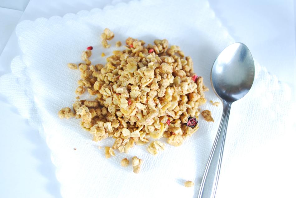 pile of Buckwheat flakes and spoon