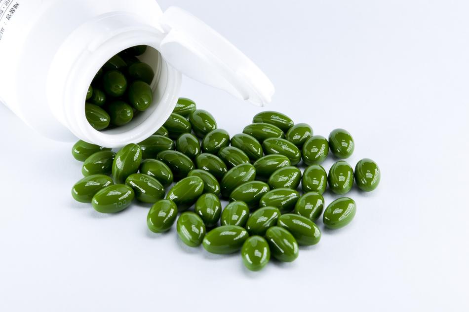 scattered green drugs