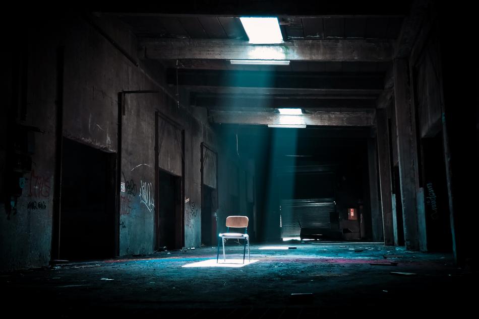 Light in the abandoned building with the chairs