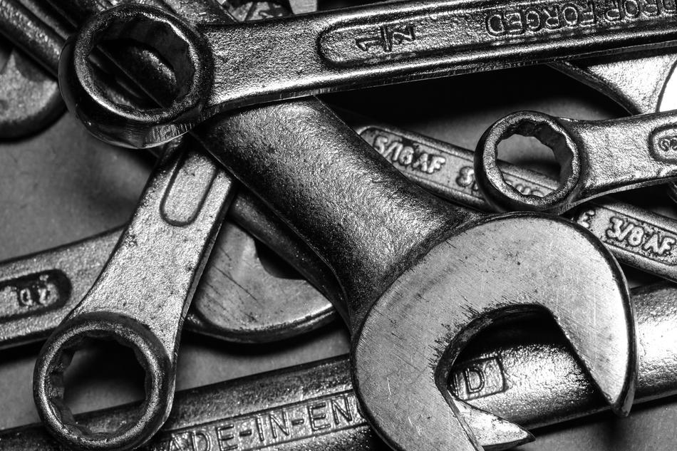 black and white photo of wrenches