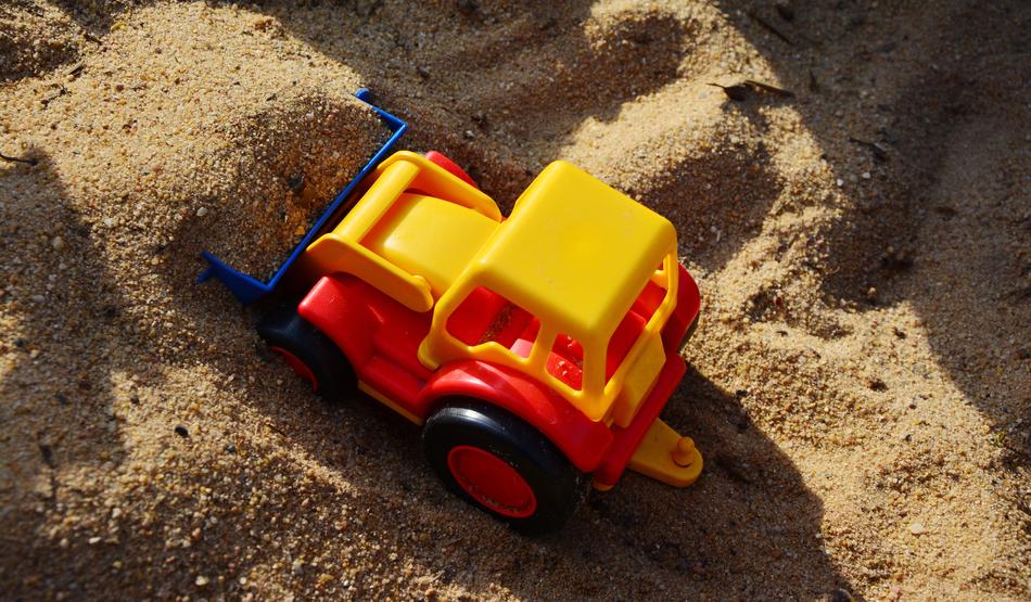 Plastic Excavators Scoop on Sand Pit