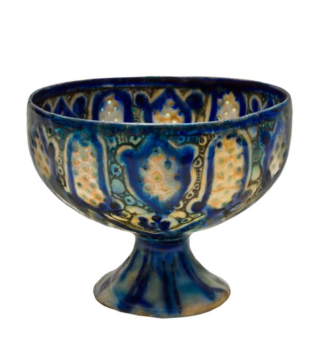Colorful and beautiful, old, patterned goblet at white background