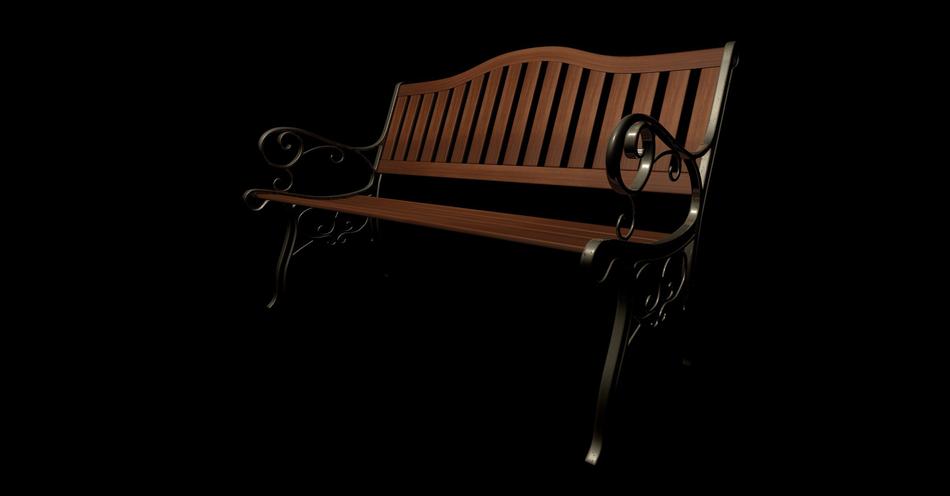 park bench in black background