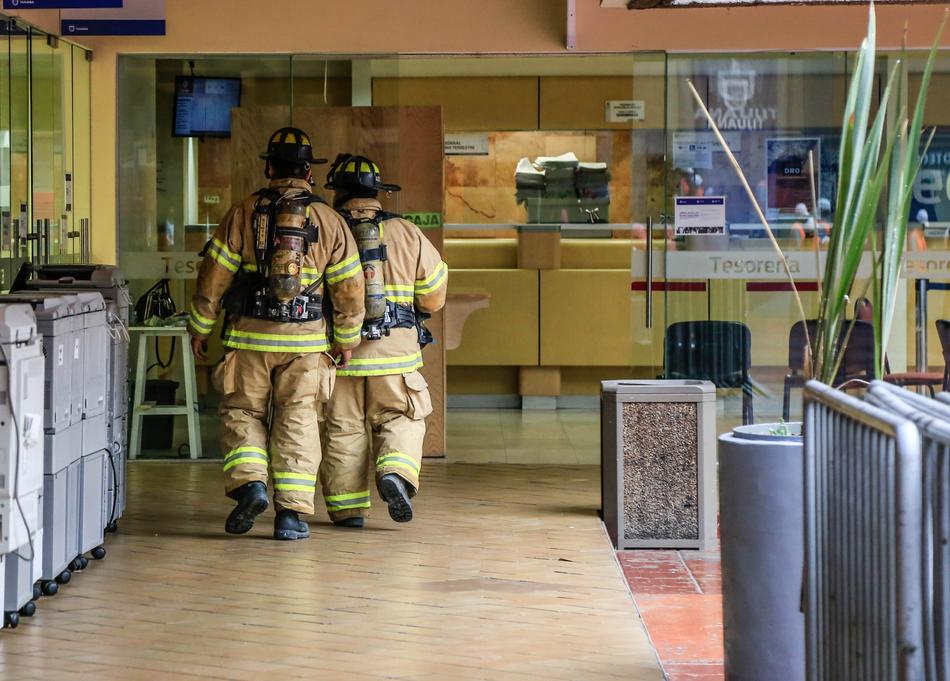 firefighters in uniform in the building