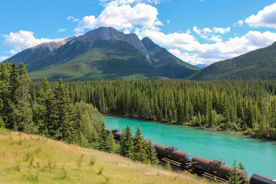 Landscape with the train among colorful beautiful nature and bow river