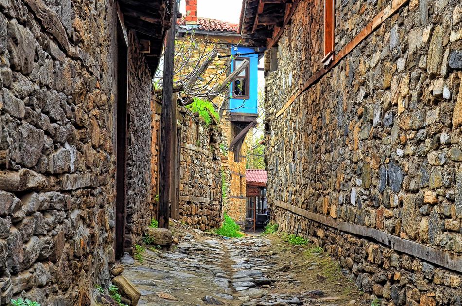 old scenic wild stone buildings on alley, turkey