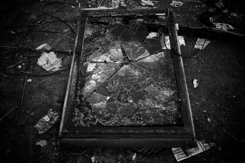 Black and white photo of the old window of the factory