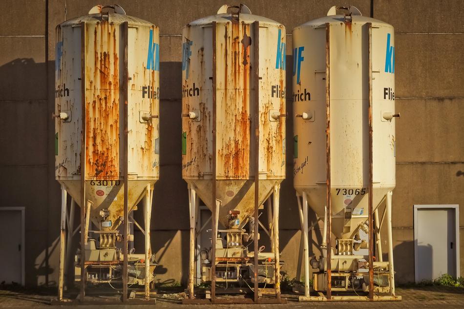 rusty silos on a construction