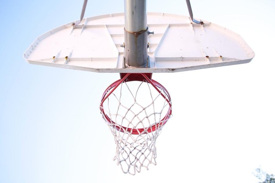 basketball hoop on blue sky background