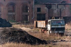rusty truck on the territory of an abandoned factory
