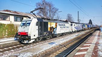 electric freight Train on Railway at winter