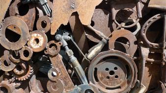 rusty metal gears in a junkyard