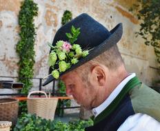 photo of a man with hops on his hat in Bavaria