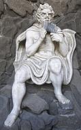 Statue Pan Flute person