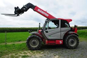 red forklift in countryside