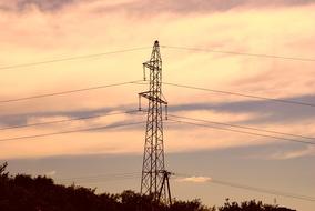 transmission lines in the evening sky