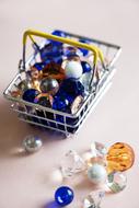 Colorful gift accessories in the shopping basket